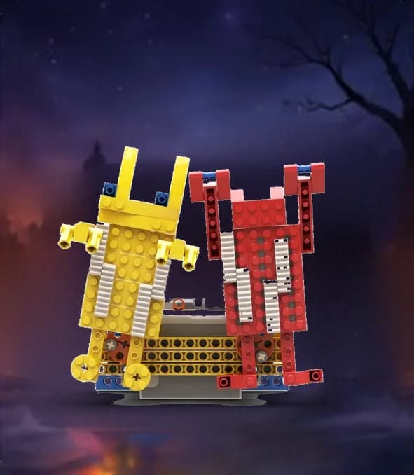 Two brick-built dancing figures